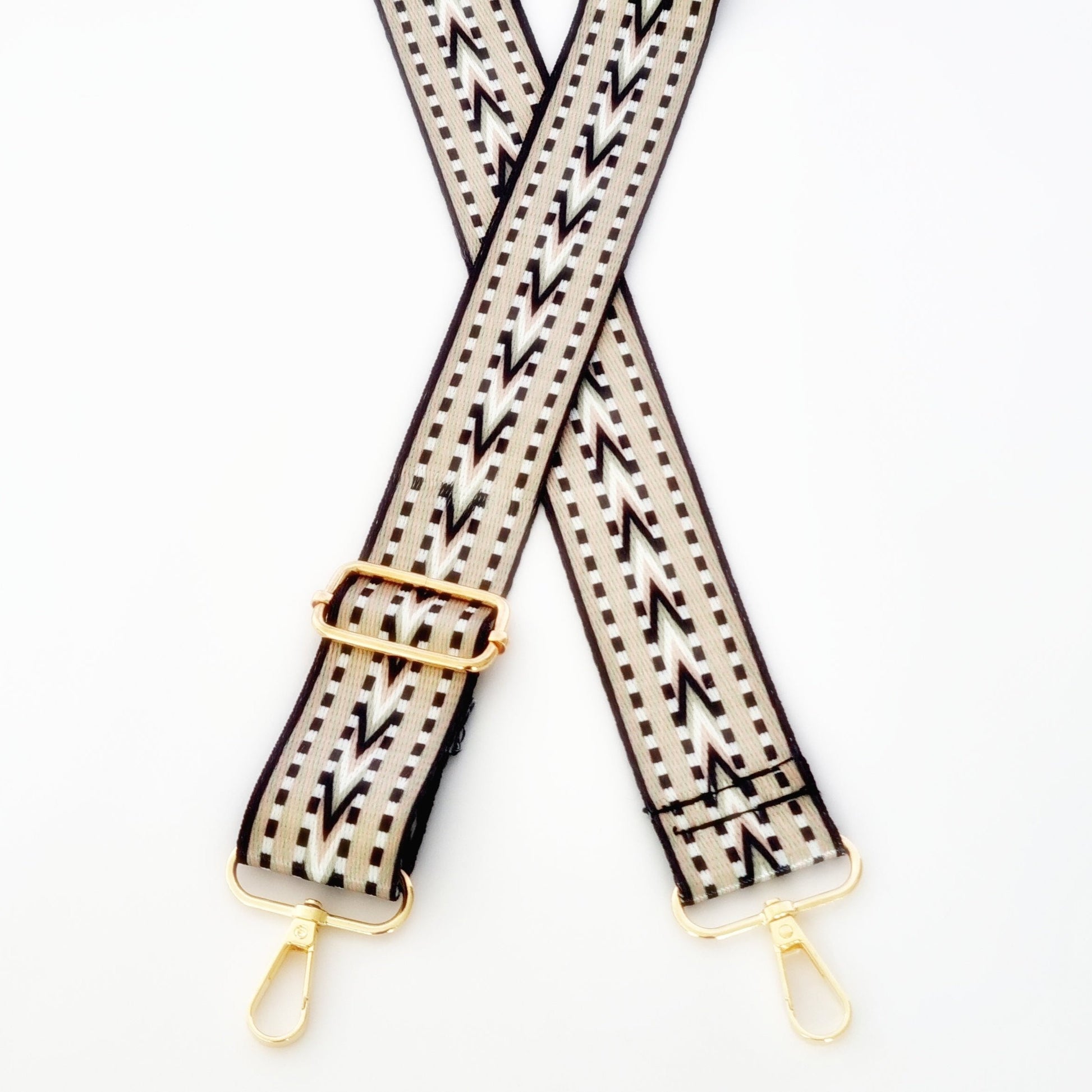 Black and platinum woven strap with gold hardware 