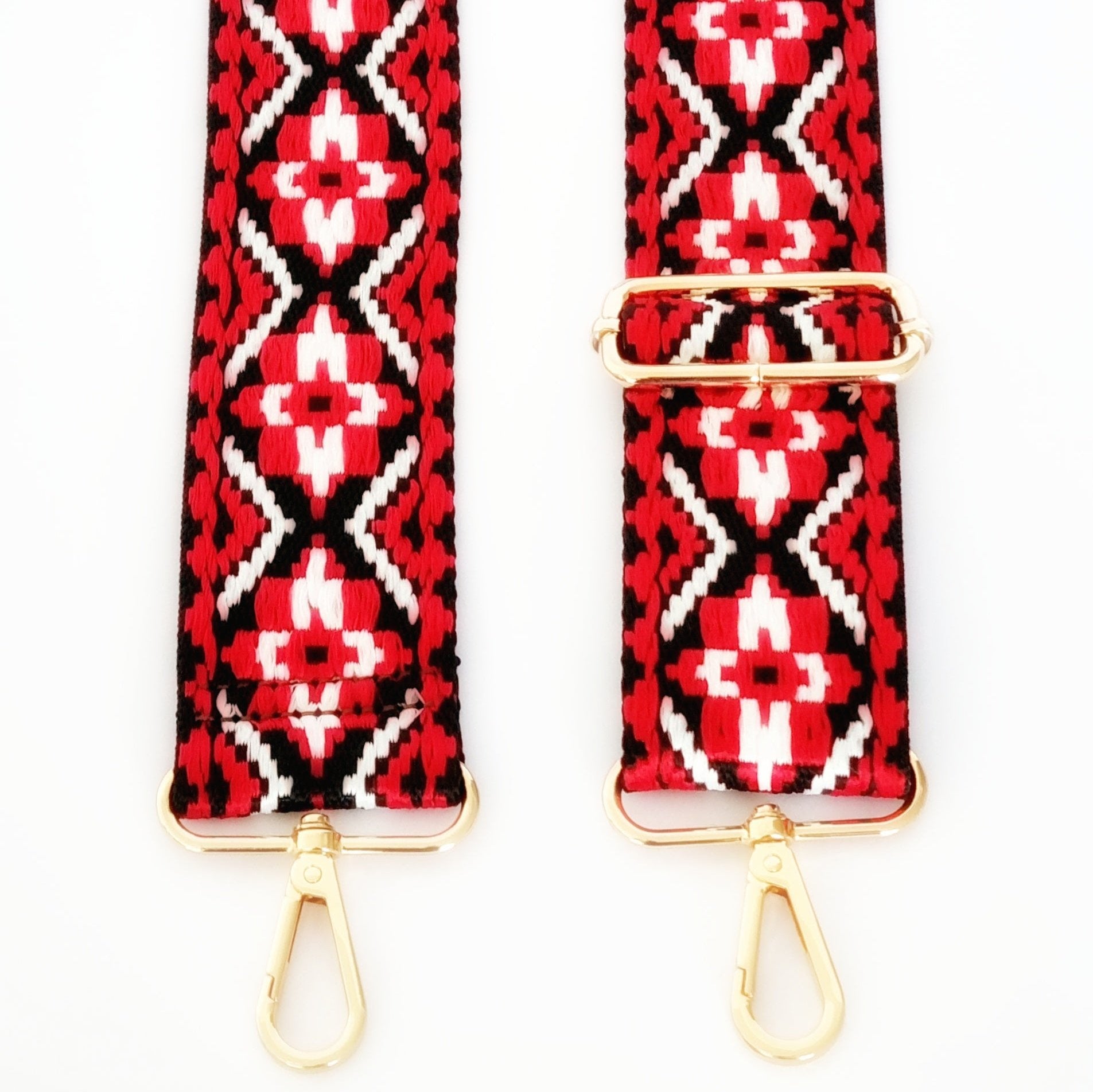 Black and red woven strap with geometric pattern and gold clasp hardware
