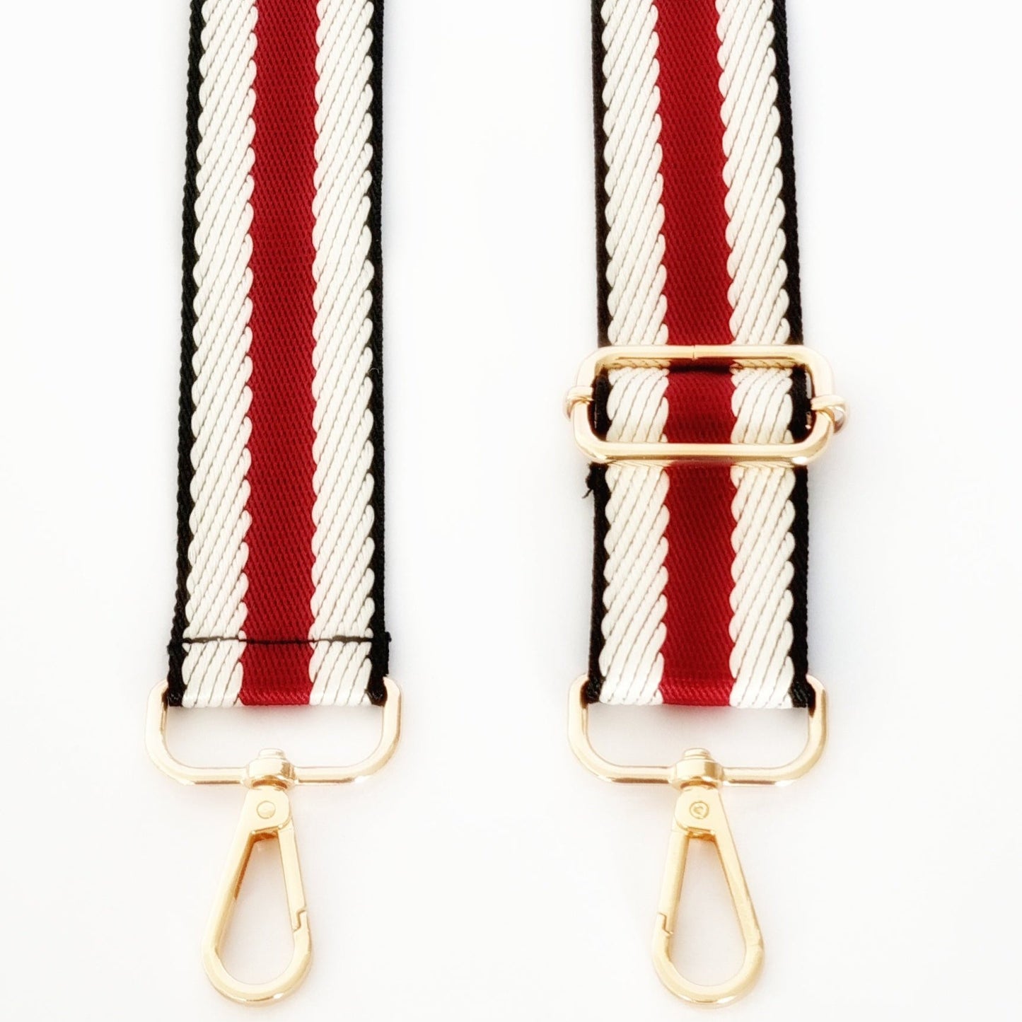 Black, white and red woven strap with gold clasp hardware 